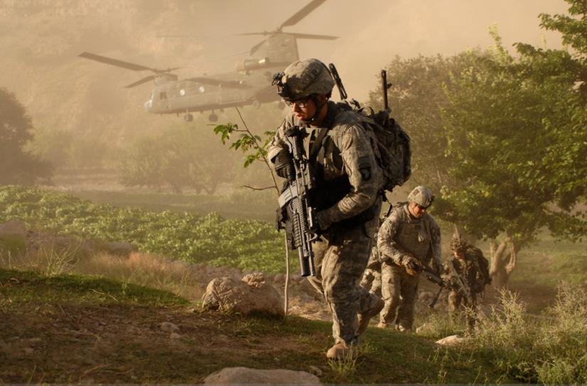 U.S. troops mounting an assault on a village in Parwan Province, Afghanistan
