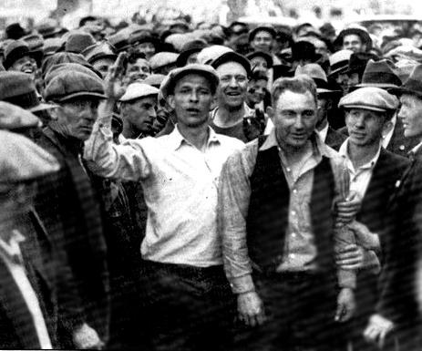 ILWU strikers escort a scab off the docks during the 1934 San Francisco general strike