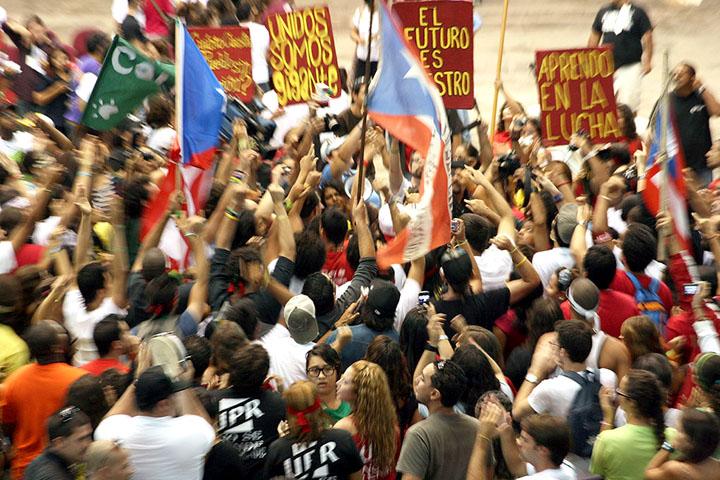 Participants in the University of Puerto Rico student strike celebrate their victory