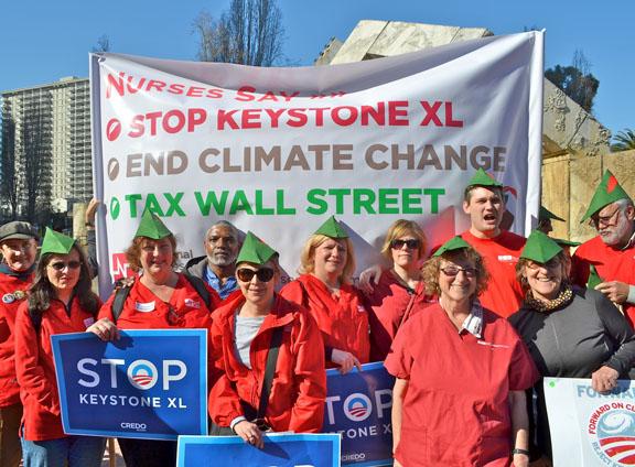 Members of National Nurses United protest the Keystone XL pipeline