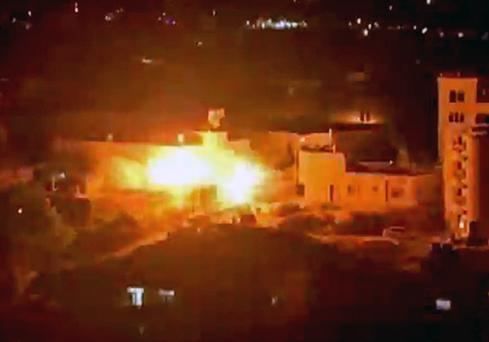 Israeli forces carry out a missile strike on a Palestinian target