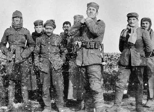 German soldiers stand in No Man's Land during the Christmas Truce in the First World War