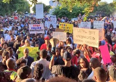 Hundreds of people fill the streets in McKinney, Texas, to protest police brutality