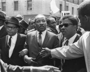 Martin Luther King marches for striking sanitation workers in Memphis on March 18, 1968
