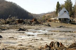 The spill from a coal-ash containment pond spread over 300 acres of land, and poured into streams and rivers