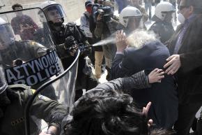 Riot police didn’t hesitate to pepper-spray 88-year-old Manolis Glezos, a living legend of the anti-Nazi resistance during the Second World War