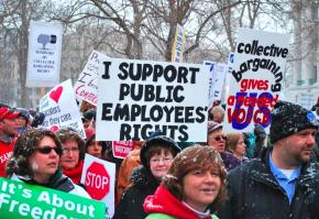 Workers and supporters gather outside the Wisconsin Capitol building in Madison