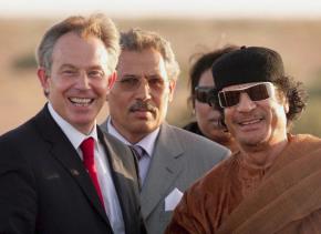 Former British Prime Minister Tony Blair with then-ally Muammar el-Qaddafi