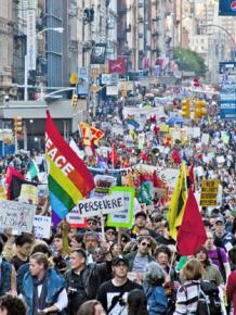 Labor, Occupy and immigrant rights activists join in a mass march in New York City on May Day