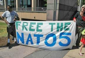 Supporters rally in defense of the NATO Five