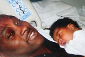 Walwyn Jackson with his newborn child