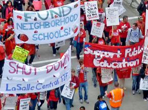 Chicago teachers march with supporters during their strike to defend quality public schools