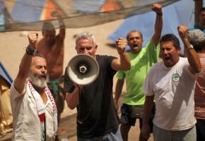 Rallying at an occupiers' encampment at Turquillas in Andalusia