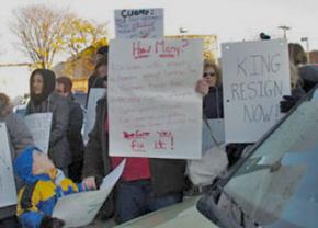 Parents protest outside a forum on Common Core standards in New York