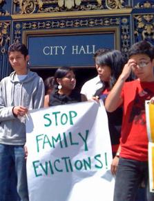Anti-eviction protesters gather on the steps of San Francisco's City Hall