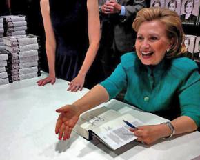 Hillary Clinton signing copies of her new book