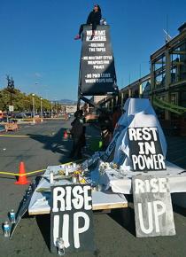 Protesters built a 30-foot-tall shrine to Yuvette Henderson in front of the entrance to Home Depot