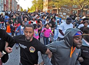 Protesters in the streets of Baltimore to demand justice for Freddie Gray