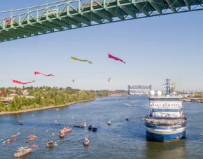 Environmental activists repel off of the St. John's Bridge in Portland, Oregon