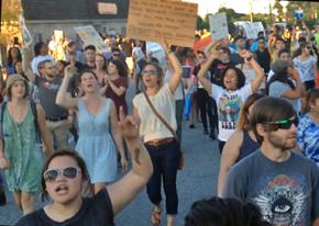 Marching against Donald Trump's appearance in Greensboro, North Carolina