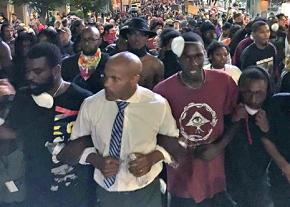 Protesters in Charlotte defy a curfew to march for justice for Keith Lamont Scott