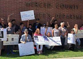 Community members rally in support of hunger strikers at the Merced County jail