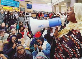 Over a thousand protesters sit in at Columbus International Airport to resist Trump's ban on Muslims
