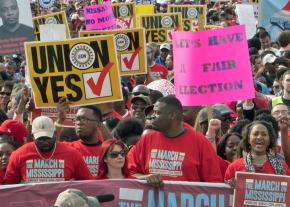 Autoworkers and their supporters march for the union in Mississippi