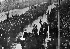 Thousands march through Petrograd to celebrate the fall of the Tsar and mourn the dead