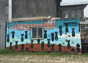 A mural on the community center in Daechuri