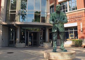 The statue of a social justice icon stands outside the DePaul student center