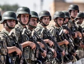 Turkish soldiers prepare for invasion at the border with Syria