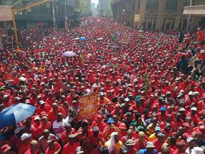 Thousands of workers take to the streets of Johannesburg, South Africa, to protest anti-labor reforms