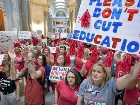 Kentucky teachers rally inside the state Capitol